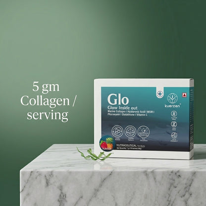 Kuerzen Glo supplement box on a marble surface with a green background